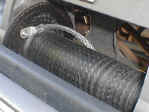 Steel winch cable unwound and ready to be removed.