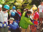 Bill Dooley and Berkeley harnessing at the ropes course.