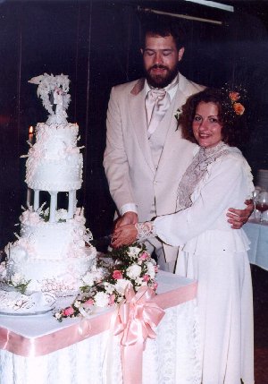 Tom and Sylvia Cutting Cake